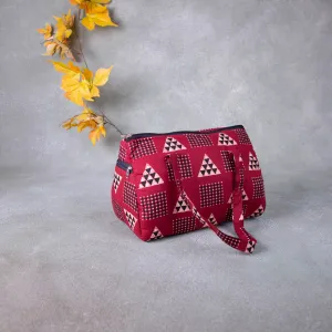 Barrel Handbags Maroon Colour with Triangle Design.